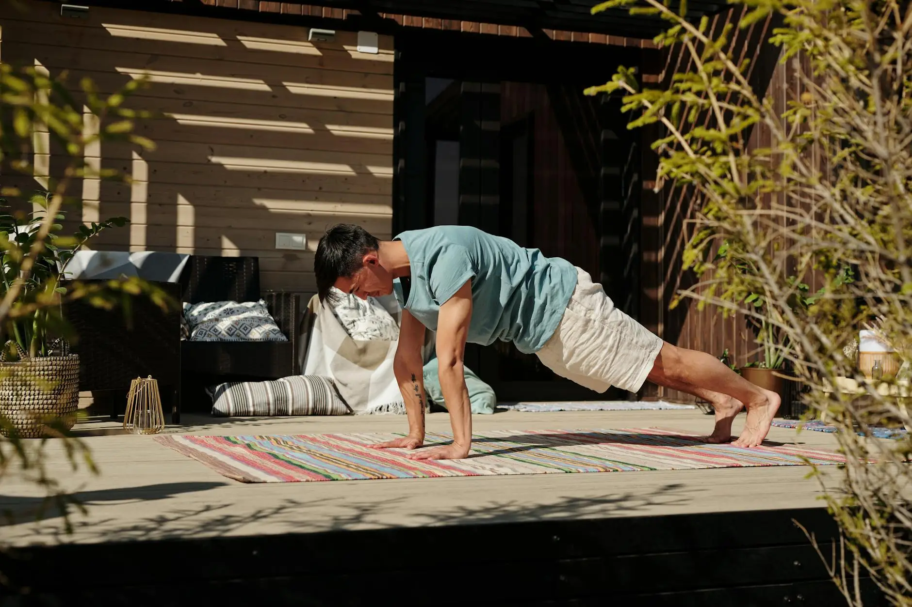 a man working out on the veranda